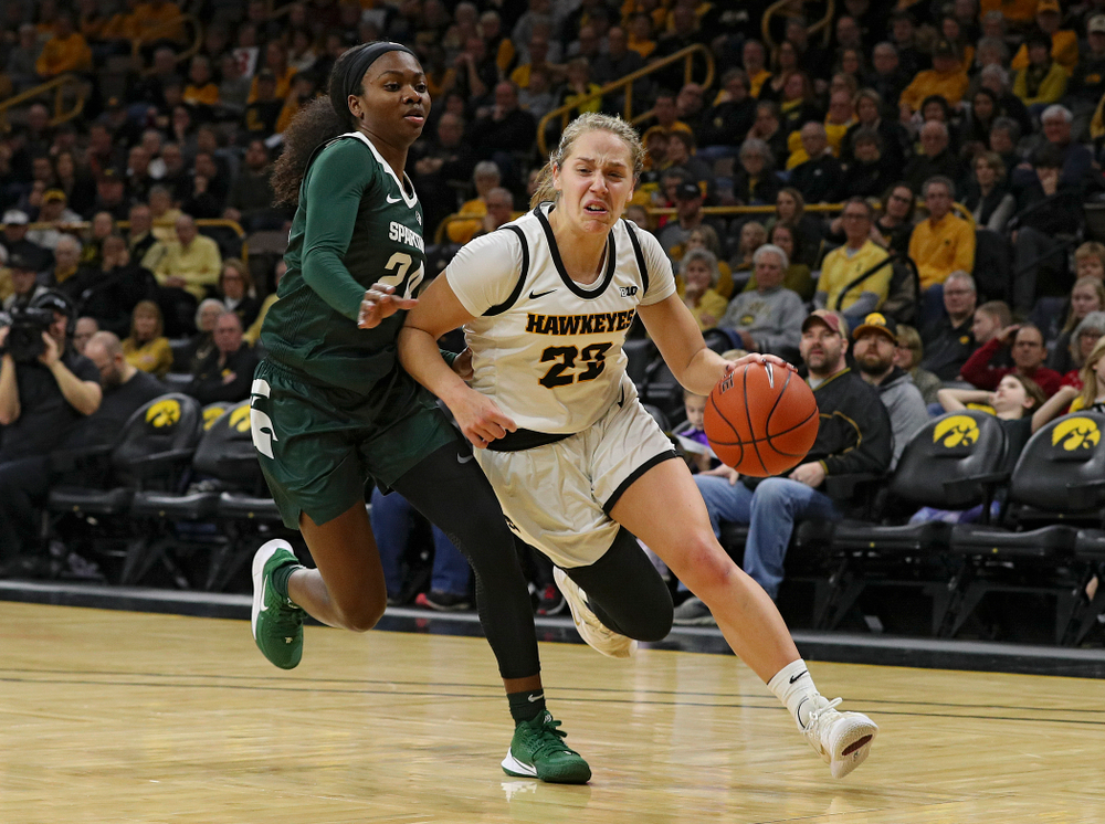 Iowa Hawkeyes guard Kathleen Doyle (22) drives with the ball during the first quarter of their game at Carver-Hawkeye Arena in Iowa City on Sunday, January 26, 2020. (Stephen Mally/hawkeyesports.com)