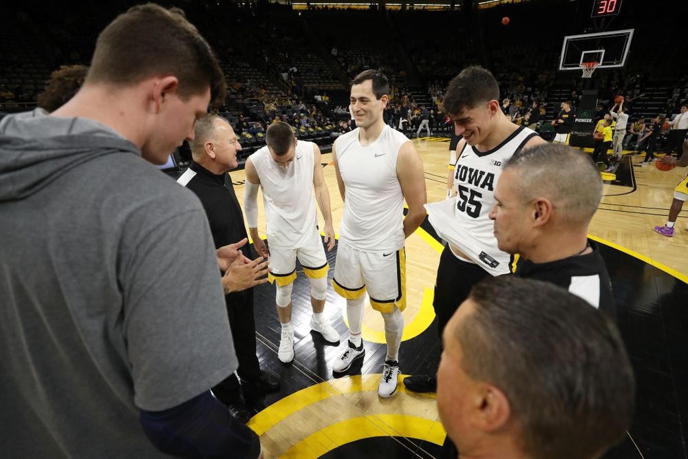 Iowa Hawkeyes guard Connor McCaffery (30), forward Ryan Kriener (15), and forward Luka Garza (55) against the Michigan Wolverines Friday, January 17, 2020 at Carver-Hawkeye Arena. (Brian Ray/hawkeyesports.com)