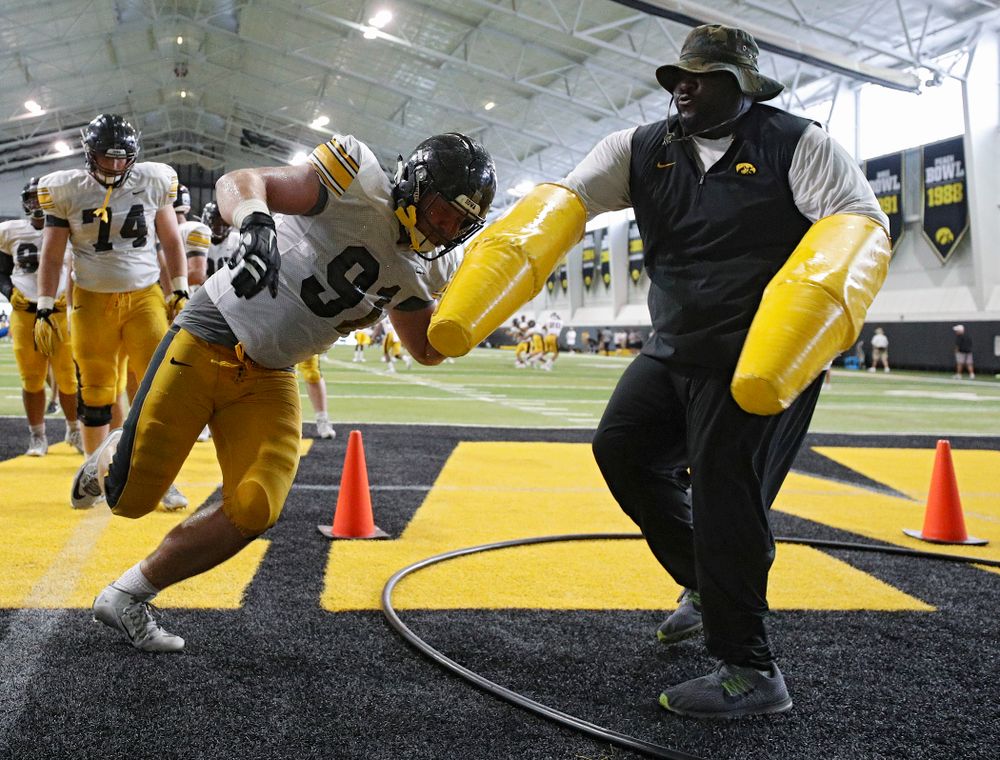 Iowa Hawkeyes defensive lineman Brady Reiff (91) works on a drill with defensive line coach Kelvin Bell during Fall Camp Practice No. 6 at the Hansen Football Performance Center in Iowa City on Thursday, Aug 8, 2019. (Stephen Mally/hawkeyesports.com)