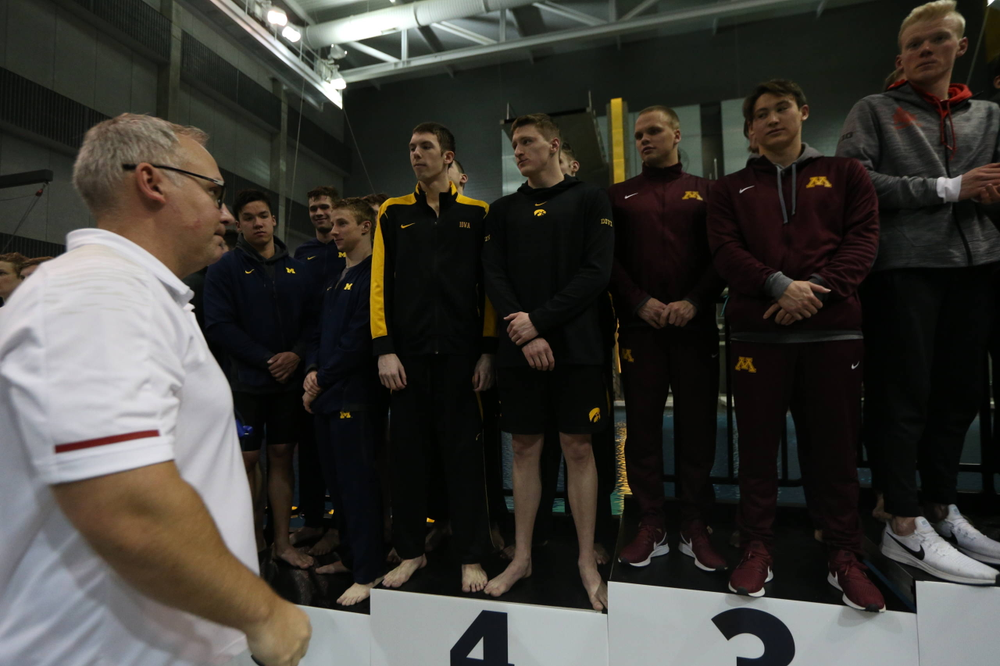 Iowa's Joe Myhre, Jack Smith, Will Scott, and Steve Fiolic after the 200-yard freestyle relay race Friday, March 1, 2019 at the Campus Recreation and Wellness Center. (Lily Smith/hawkeyesports.com)