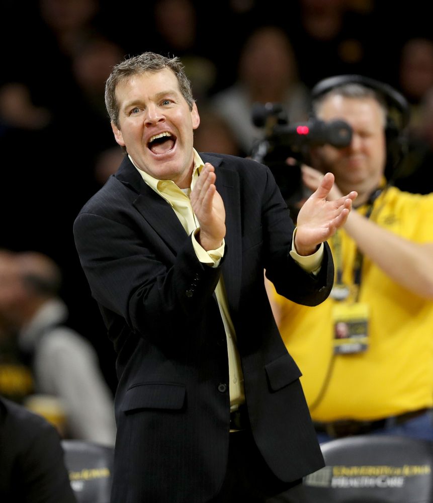 Head Coach Tom Brands works the edge of the mat as Iowa’s Michael Kemerer wrestles Ohio State’s Kaleb Romero at 174 pounds Friday, January 24, 2020 at Carver-Hawkeye Arena. Kemerer won the match 7-1. (Brian Ray/hawkeyesports.com)