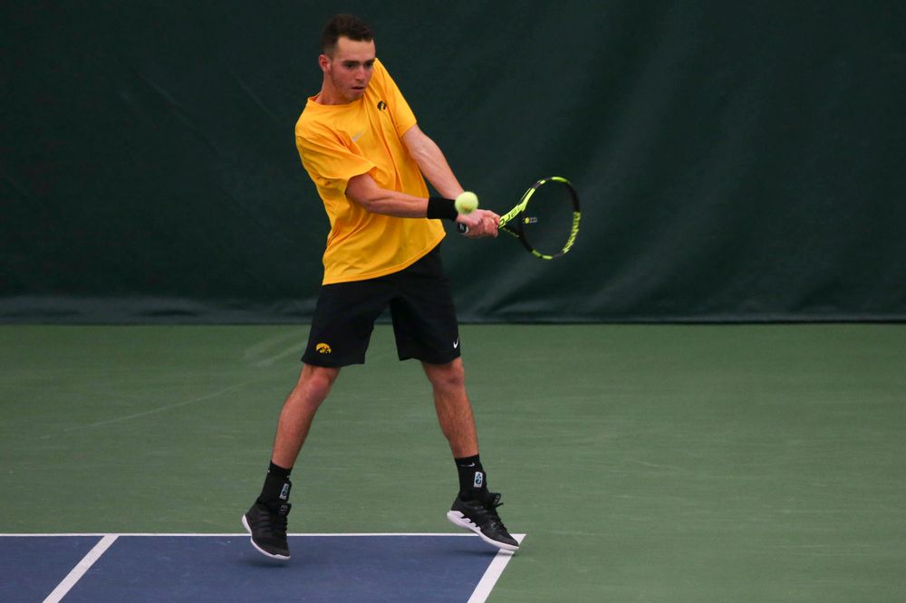 Iowa's Kareem Allaf at a tennis match vs Drake Friday, March 8, 2019 at the Hawkeye Tennis and Recreation Complex. (Lily Smith/hawkeyesports.com)