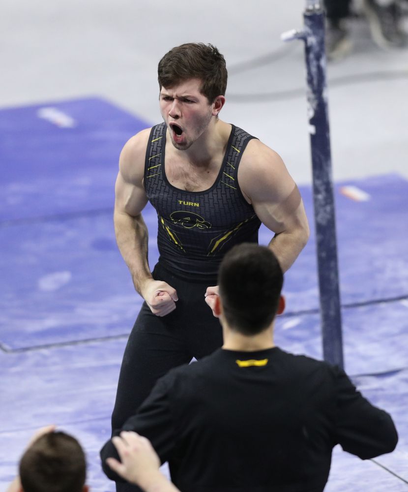 Iowa's Rogelio Vazquez competes on the parallel bars against Oklahoma Saturday, February 9, 2019 at Carver-Hawkeye Arena. (Brian Ray/hawkeyesports.com)