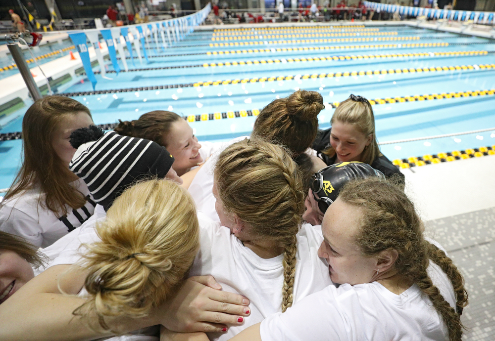 Iowa’s Kelsey Drake is greeted by teammates after she broke a school record in a 200 yard butterfly time trial during the 2020 Big Ten Women’s Swimming and Diving Championships at the Campus Recreation and Wellness Center in Iowa City on Wednesday, February 19, 2020. (Stephen Mally/hawkeyesports.com)