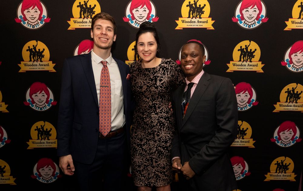 Iowa Hawkeyes forward Megan Gustafson (10) on the red carpet WisconsinÕs Ethan Happ and Michigan StateÕs Cassius Winston before the ESPN College Basketball Awards show Friday, April 12, 2019 at The Novo at LA Live. (Brian Ray/hawkeyesports.com)