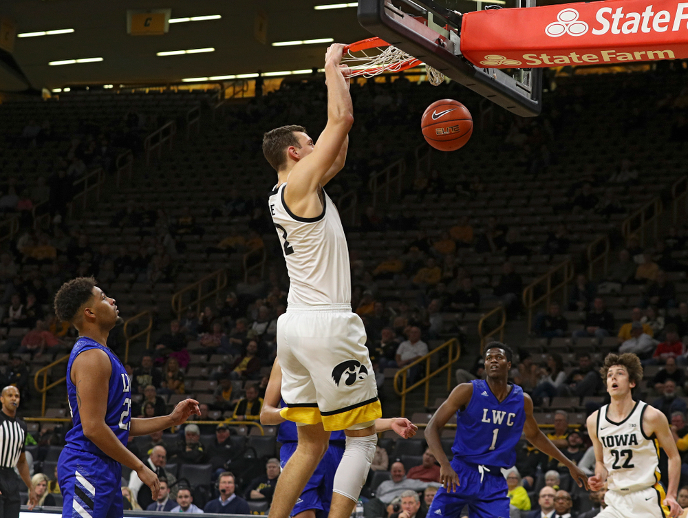 Iowa Hawkeyes forward Jack Nunge (2) dunks the ball during the second half of their exhibition game against Lindsey Wilson College at Carver-Hawkeye Arena in Iowa City on Monday, Nov 4, 2019. (Stephen Mally/hawkeyesports.com)