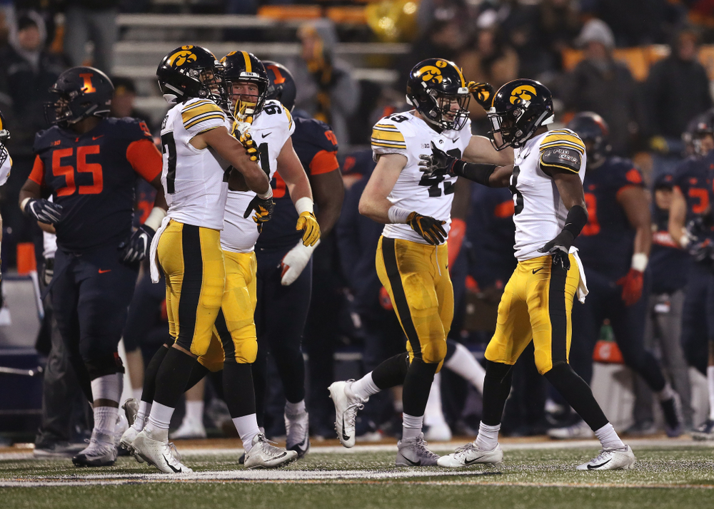Iowa Hawkeyes defensive back Amani Hooker (27) intercepts a pass against the Illinois Fighting Illini Saturday, November 17, 2018 at Memorial Stadium in Champaign, Ill. (Brian Ray/hawkeyesports.com)