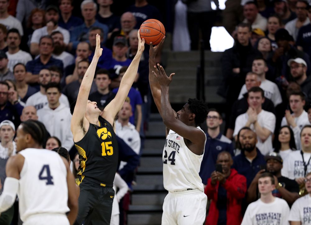 Iowa Hawkeyes forward Ryan Kriener (15) blocks a shot against Penn State Friday, January 3, 2020 at the Palestra in Philadelphia. (Brian Ray/hawkeyesports.com)