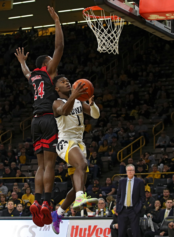 Iowa Hawkeyes guard Joe Toussaint (1) scores a basket during the second half of their game at Carver-Hawkeye Arena in Iowa City on Friday, Nov 8, 2019. (Stephen Mally/hawkeyesports.com)