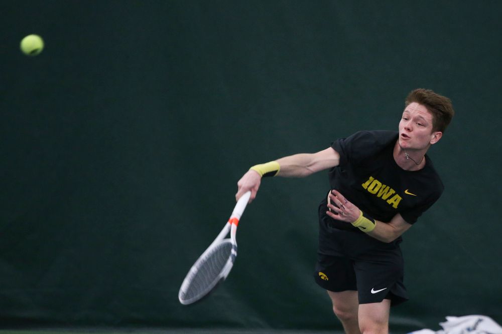 Iowa’s Jason Kerst returns a hit during the Iowa men’s tennis meet vs VCU on Saturday, February 29, 2020 at the Hawkeye Tennis and Recreation Complex. (Lily Smith/hawkeyesports.com)