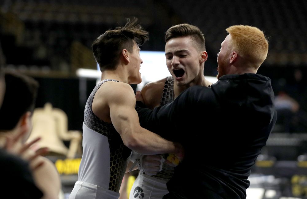 Iowa’s Mitch Mandozzi competes on the high bar against Illinois Sunday, March 1, 2020 at Carver-Hawkeye Arena. (Brian Ray/hawkeyesports.com)
