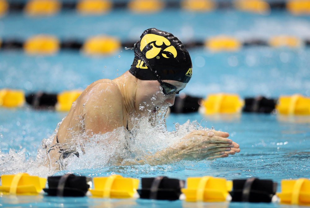 IowaÕs Aleksandra Olesiak swims the 100 yard breaststroke against the Michigan Wolverines Friday, November 1, 2019 at the Campus Recreation and Wellness Center. (Brian Ray/hawkeyesports.com)