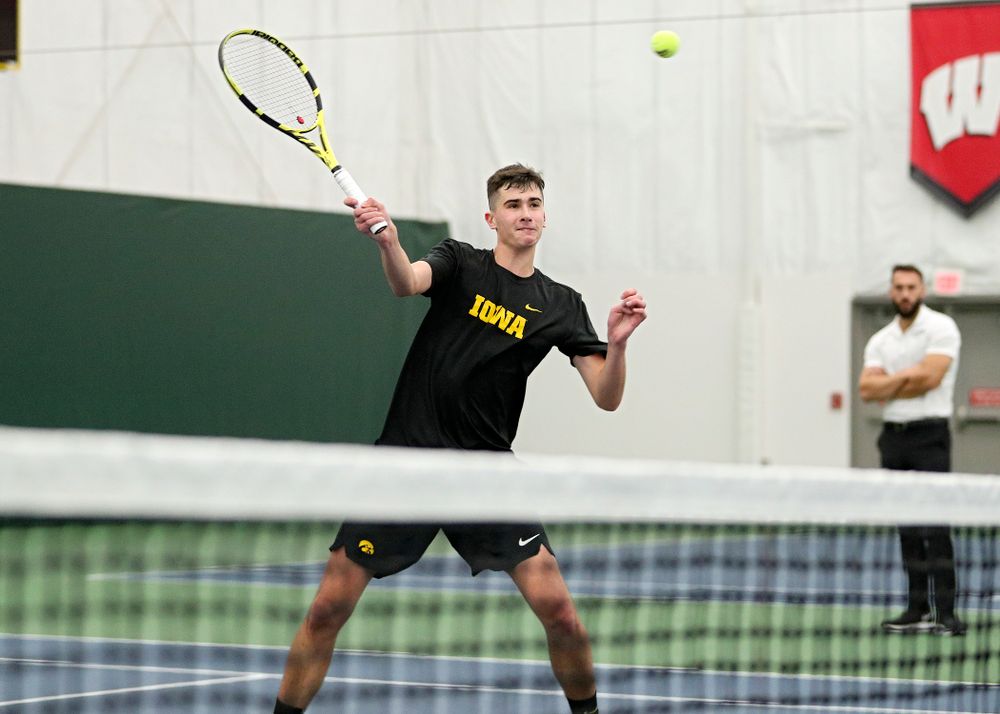 Iowa’s Matt Clegg returns a shot during his doubles match at the Hawkeye Tennis and Recreation Complex in Iowa City on Thursday, January 16, 2020. (Stephen Mally/hawkeyesports.com)