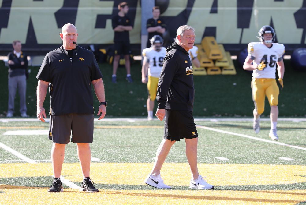 Iowa Hawkeyes head coach Kirk Ferentz and strength and conditioning coordinator Chris Doyle during the teamÕs final spring practice Friday, April 26, 2019 at the Kenyon Football Practice Facility. (Brian Ray/hawkeyesports.com)