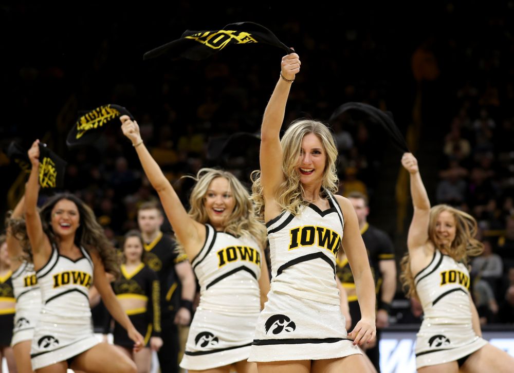 The Iowa Cheerleaders and Dance Team perform on senior night at half-time of the Iowa Hawkeyes game against the Purdue Boilermakers Tuesday, March 3, 2020 at Carver-Hawkeye Arena. (Brian Ray/hawkeyesports.com)