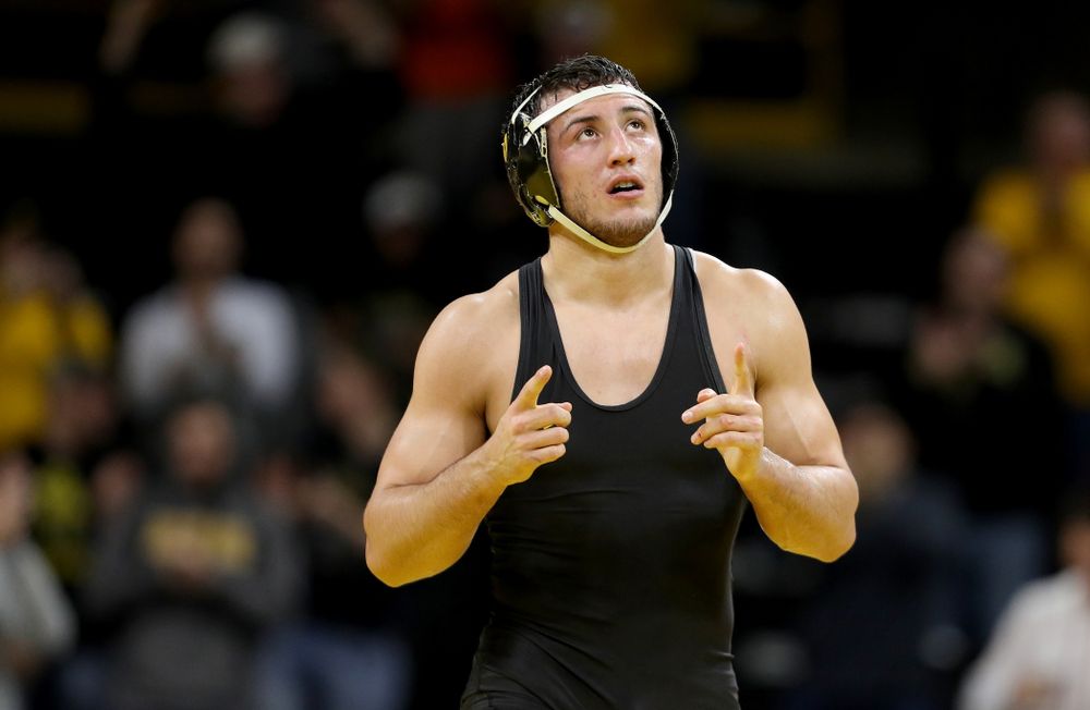 IowaÕs Michael Kemerer wrestles WisconsinÕs Jared Krattinger at 174 pounds Sunday, December 1, 2019 at Carver-Hawkeye Arena. Kemerer won the match with a fall. (Brian Ray/hawkeyesports.com)
