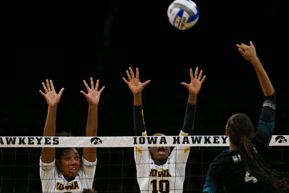 Iowa Hawkeyes middle blocker Amiya Jones (9) and Iowa Hawkeyes outside hitter Griere Hughes (10) against Coastal Carolina Friday, September 20, 2019 at Carver-Hawkeye Arena. (Lily Smith/hawkeyesports.com)