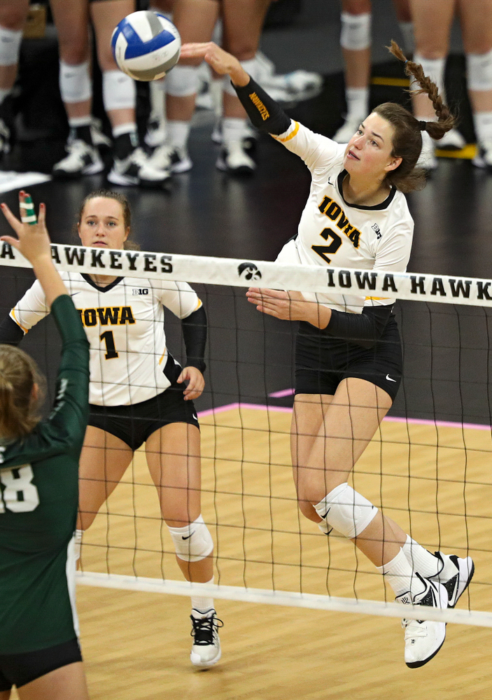 Iowa’s Courtney Buzzerio (2) lines up a shot during the first set of their volleyball match at Carver-Hawkeye Arena in Iowa City on Sunday, Oct 13, 2019. (Stephen Mally/hawkeyesports.com)