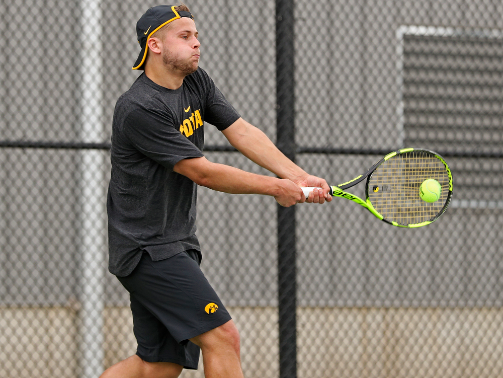 Iowa's Will Davies competes during a match against Ohio State at the Hawkeye Tennis and Recreation Complex in Iowa City on Sunday, Apr. 7, 2019. (Stephen Mally/hawkeyesports.com)