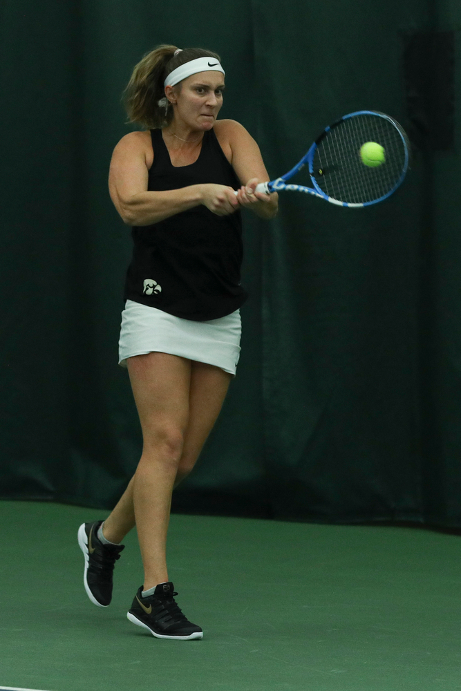 Iowa’s Ashleigh Jacobs returns a hit during the Iowa women’s tennis meet vs DePaul on Friday, February 21, 2020 at the Hawkeye Tennis and Recreation Complex. (Lily Smith/hawkeyesports.com)