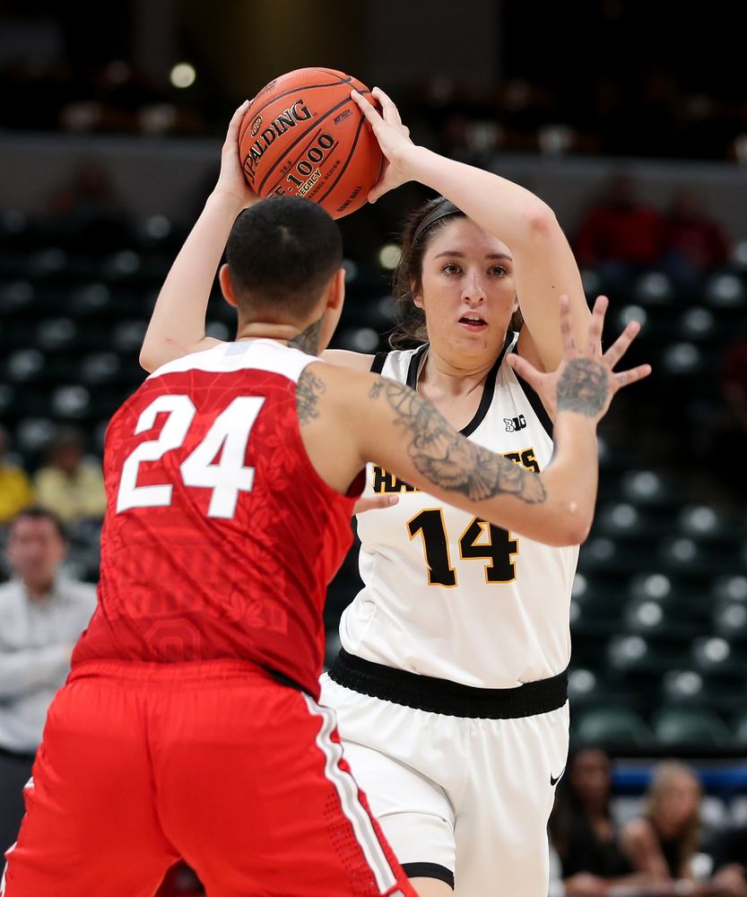Iowa Hawkeyes forward McKenna Warnock (14) against Ohio State in the quarterfinals of the Big Ten Basketball Tournament Friday, March 6, 2020 at Bankers Life Fieldhouse in Indianapolis. (Brian Ray/hawkeyesports.com)