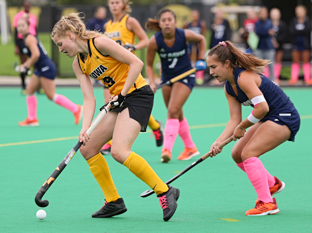 Iowa’s Sofie Stribos (9) spins with the ball during the second quarter of their game against UC Davis at Grant Field in Iowa City on Sunday, Oct 6, 2019. (Stephen Mally/hawkeyesports.com)