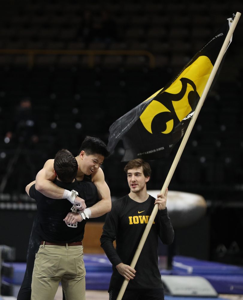 Iowa's Bennet Huang competes on the high bar against the Ohio State Buckeyes Saturday, March 16, 2019 at Carver-Hawkeye Arena. (Brian Ray/hawkeyesports.com)