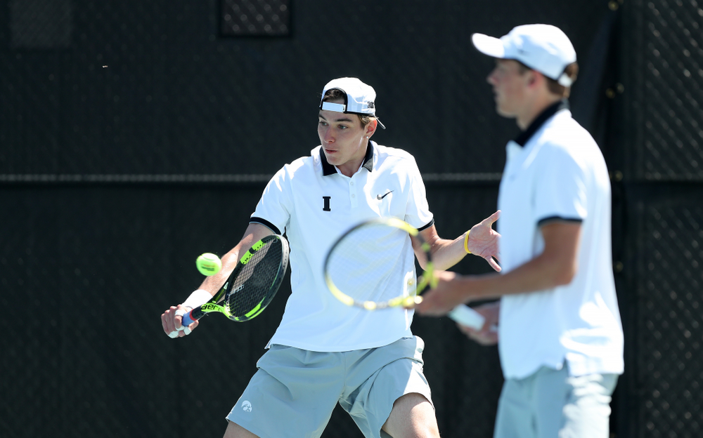 IowaÕs Joe Tyler and Nikita Snezhko play a doubles match against the Michigan Wolverines Sunday, April 21, 2019 at the Hawkeye Tennis and Recreation Complex. (Brian Ray/hawkeyesports.com)