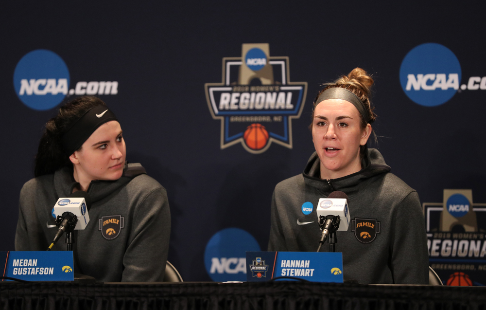 Iowa Hawkeyes forward Megan Gustafson (10) and forward Hannah Stewart (21) against the NC State Wolfpack in the regional semi-final of the 2019 NCAA Women's College Basketball Tournament Saturday, March 30, 2019 at Greensboro Coliseum in Greensboro, NC.(Brian Ray/hawkeyesports.com)