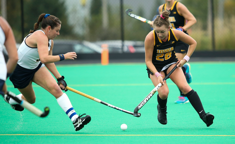 Iowa Hawkeyes forward Madeleine Murphy (26) dribbles through traffic during a game against Michigan at Grant Field on October 5, 2018. (Tork Mason/hawkeyesports.com)