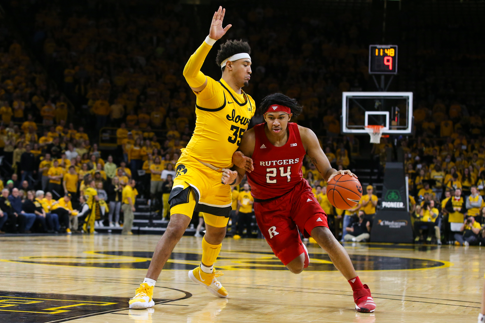 Iowa Hawkeyes forward Cordell Pemsl (35) defends against Rutgers guard Ron Harper Jr. during the Iowa men’s basketball game vs Rutgers on Wednesday, January 22, 2020 at Carver-Hawkeye Arena. (Lily Smith/hawkeyesports.com)
