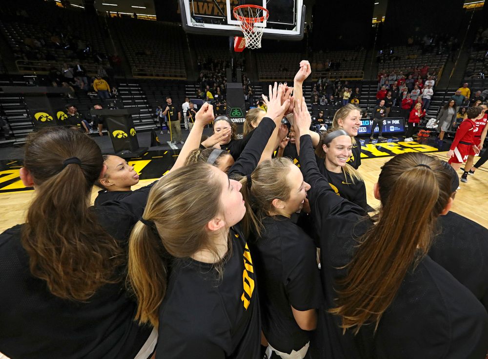 The Hawkeyes huddle before the game at Carver-Hawkeye Arena in Iowa City on Thursday, February 6, 2020. (Stephen Mally/hawkeyesports.com)
