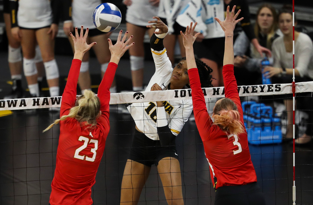 Iowa Hawkeyes outside hitter Taylor Louis (16) spikes the ball during a match against Maryland at Carver-Hawkeye Arena on November 23, 2018. (Tork Mason/hawkeyesports.com)