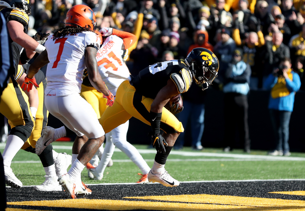 Iowa Hawkeyes running back Tyler Goodson (15) scores a touchdown against the Illinois Fighting Illini Saturday, November 23, 2019 at Kinnick Stadium. (Brian Ray/hawkeyesports.com)