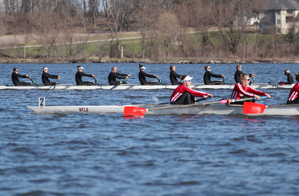 Iowa's Rachel Kram (from left), Lauren Collier, Noelle Ossenkop, Erika Davidson, Riley Seufert, Molly Rygh, Kirsten Jurgersen, Amelia Juhl, and Alexis Wolf during their I Novice 8 race against Wisconsin in their Big Ten Double Dual Rowing Regatta at Lake Macbride in Solon on Saturday, Apr. 13, 2019. (Stephen Mally/hawkeyesports.com)