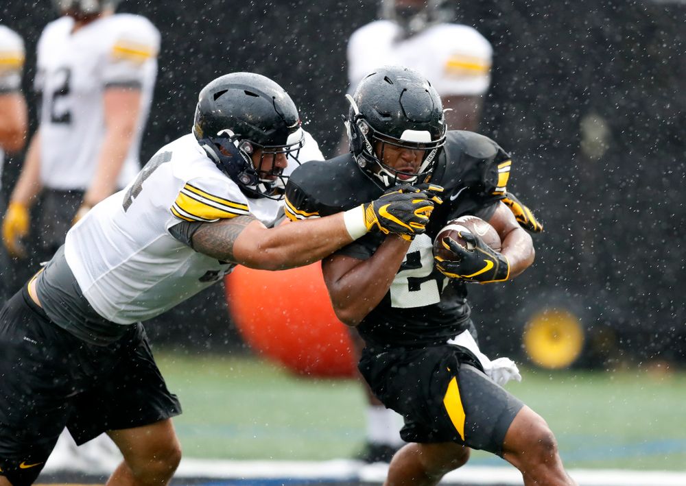 Iowa Hawkeyes defensive end A.J. Epenesa (94) and running back Ivory Kelly-Martin (21) during camp practice No. 15 Monday, August 20, 2018 at the Hansen Football Performance Center. (Brian Ray/hawkeyesports.com)