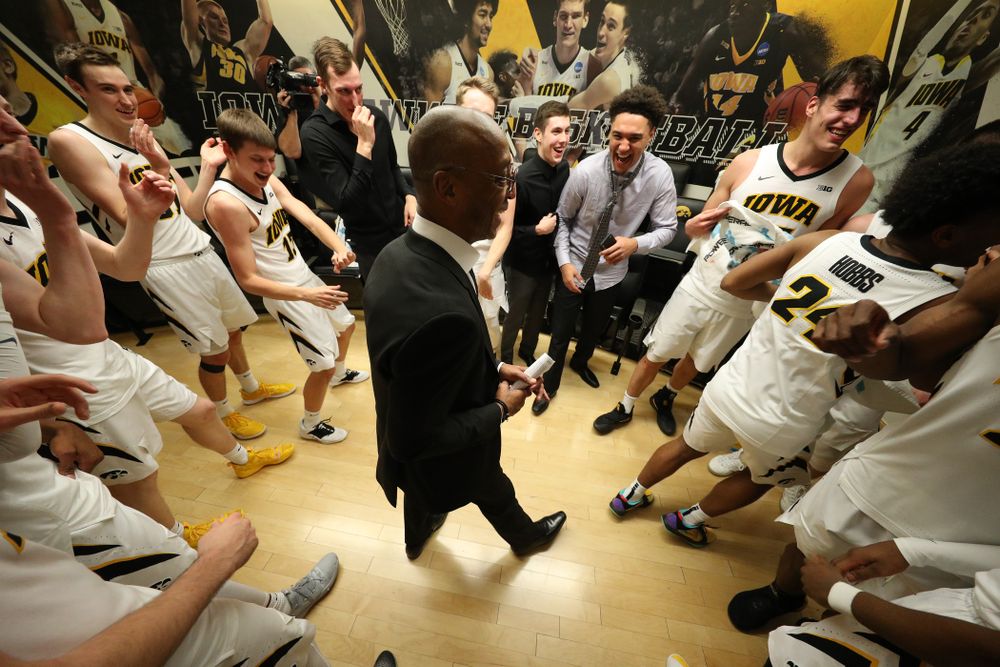 Iowa Hawkeyes assistant coach Sherman Dillard dances in the locker room following their victory over the Michigan Wolverines Friday, February 1, 2019 at Carver-Hawkeye Arena. (Brian Ray/hawkeyesports.com)