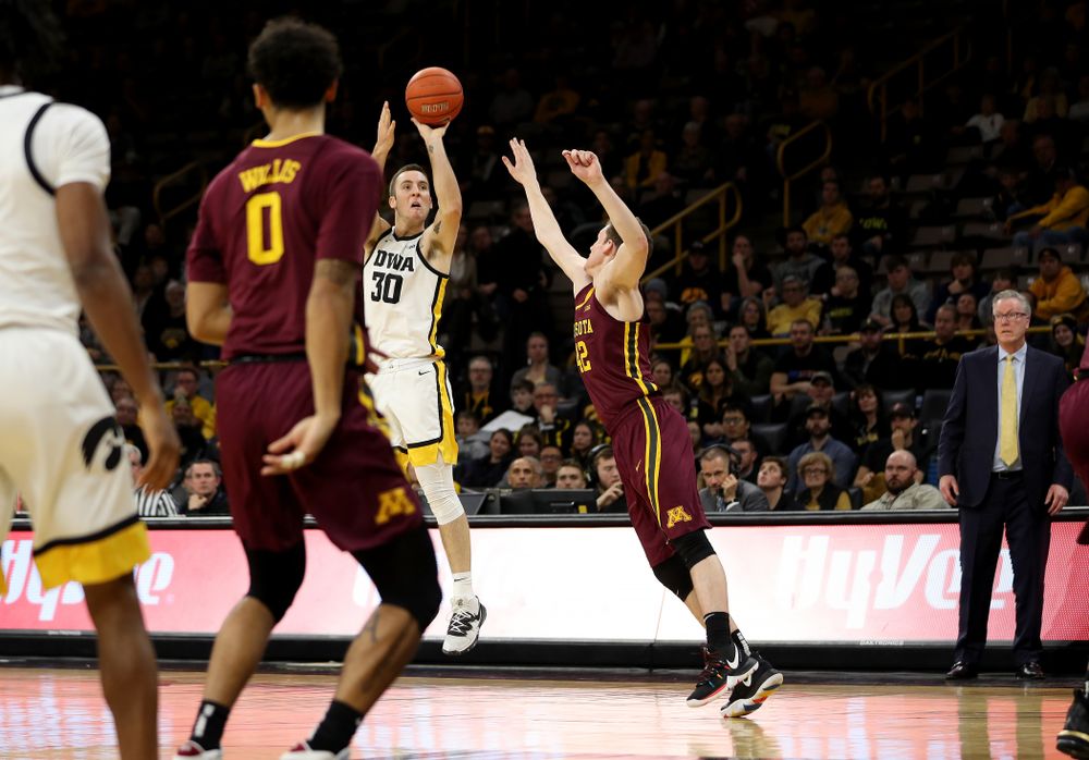 Iowa Hawkeyes guard Connor McCaffery (30) knocks down a three point basket against the Minnesota Golden Gophers Monday, December 9, 2019 at Carver-Hawkeye Arena. (Brian Ray/hawkeyesports.com)