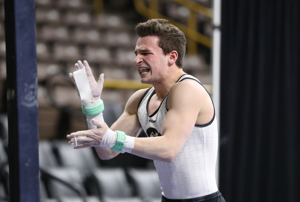 Iowa's Jake Brodarzon competes on the rings against UIC and Minnesota Saturday, February 2, 2019 at Carver-Hawkeye Arena. (Brian Ray/hawkeyesports.com)