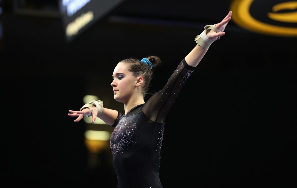Iowa’s Allie Gilchrist competes on the beam against Michigan Friday, February 14, 2020 at Carver-Hawkeye Arena. (Brian Ray/hawkeyesports.com)