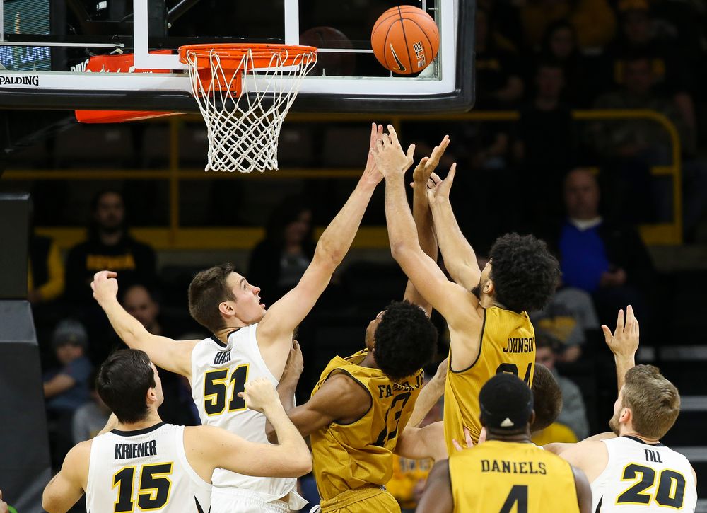 Iowa Hawkeyes forward Nicholas Baer (51) fights for a rebound during a game against Alabama State at Carver-Hawkeye Arena on November 21, 2018. (Tork Mason/hawkeyesports.com)