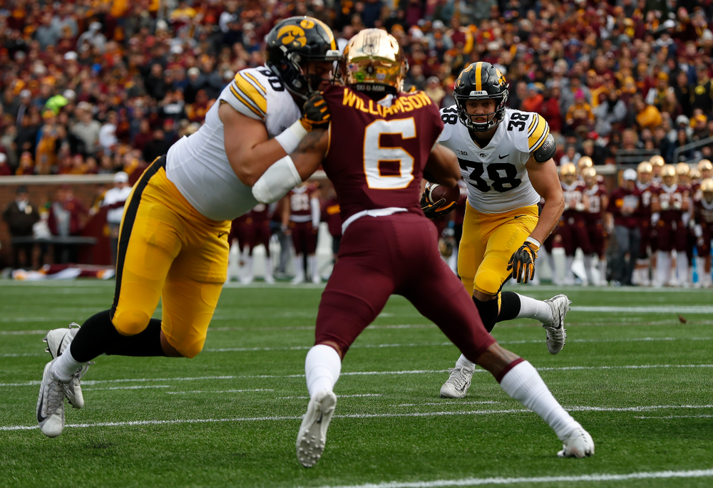Iowa Hawkeyes tight end T.J. Hockenson (38) scores on a fake field goal against the Minnesota Golden Gophers Saturday, October 6, 2018 at TCF Bank Stadium. (Brian Ray/hawkeyesports.com)