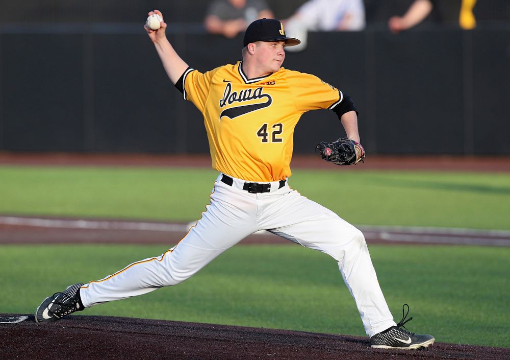 Iowa Hawkeyes pitcher Trace Hoffman (42) delivers to the plate during the eighth inning of their game against Northern Illinois at Duane Banks Field in Iowa City on Tuesday, Apr. 16, 2019. (Stephen Mally/hawkeyesports.com)
