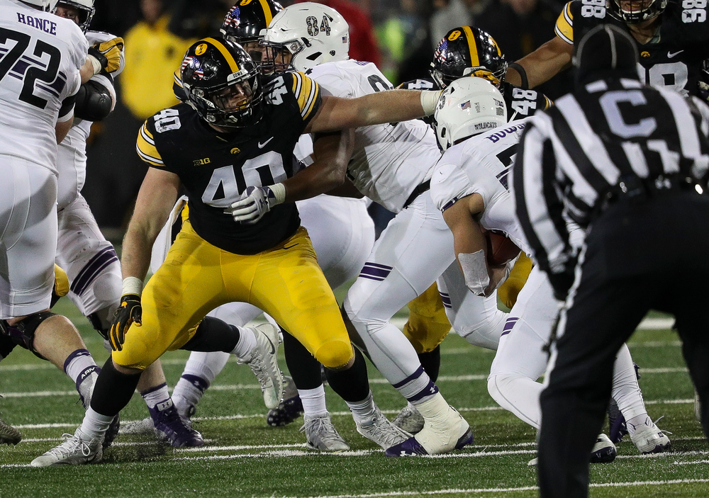 Iowa Hawkeyes defensive end Parker Hesse (40) sheds a block during a game against Northwestern at Kinnick Stadium on November 10, 2018. (Tork Mason/hawkeyesports.com)