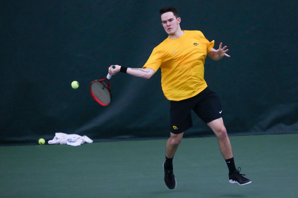 Iowa's Jonas Larsen at a tennis match vs Drake Friday, March 8, 2019 at the Hawkeye Tennis and Recreation Complex. (Lily Smith/hawkeyesports.com)