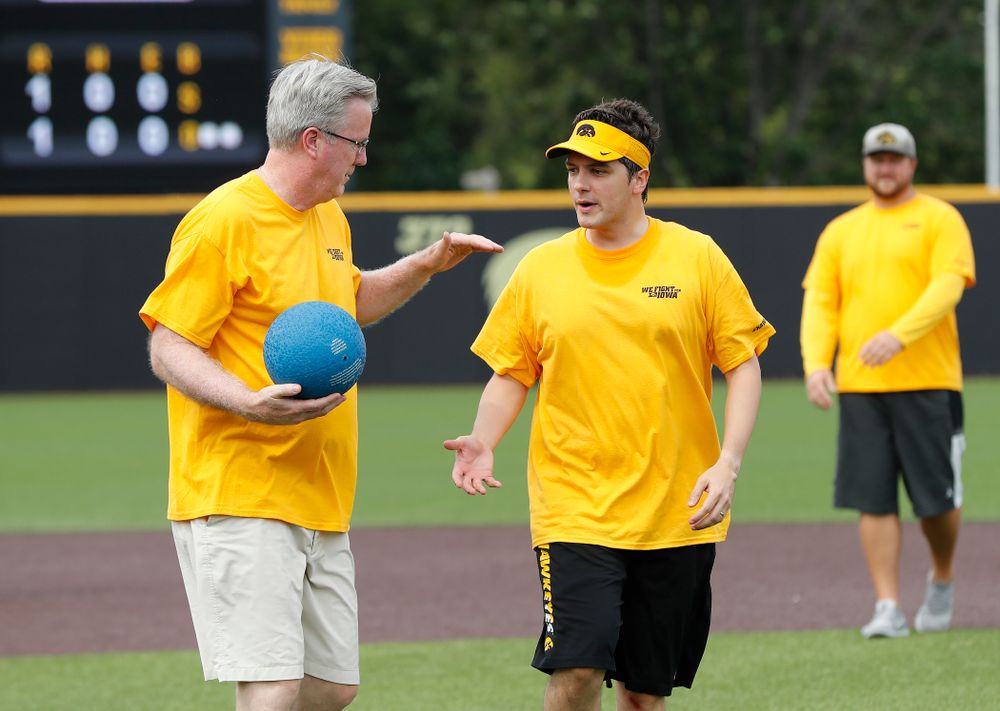 Head Men's Basketball Coach Fran McCaffery and Asst. Director Compliance Henry Archuleta during the Iowa Student Athlete Kickoff Kickball game Sunday, August 19, 2018 at Duane Banks Field. (Brian Ray/hawkeyesports.com)