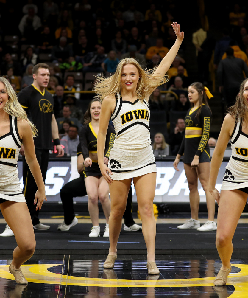 The Iowa Cheerleaders and Dance Team perform on senior night at half-time of the Iowa Hawkeyes game against the Purdue Boilermakers Tuesday, March 3, 2020 at Carver-Hawkeye Arena. (Brian Ray/hawkeyesports.com)