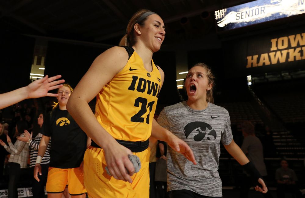 Iowa Hawkeyes forward Hannah Stewart (21) and guard Kathleen Doyle (22) against the Robert Morris Colonials Sunday, December 2, 2018 at Carver-Hawkeye Arena. (Brian Ray/hawkeyesports.com)