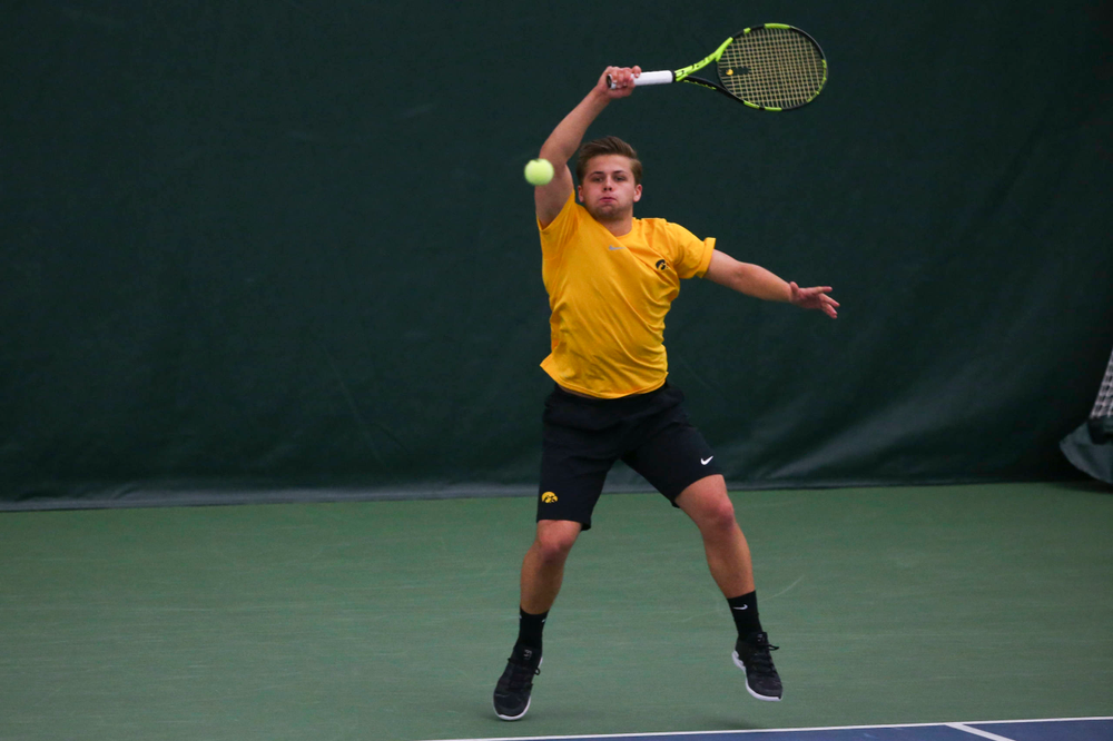 Iowa's Will Davies at a tennis match vs Drake Friday, March 8, 2019 at the Hawkeye Tennis and Recreation Complex. (Lily Smith/hawkeyesports.com)