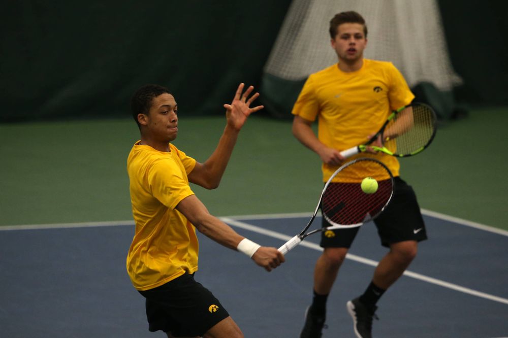 Iowa's Oliver Okonkwo at a tennis match vs Drake Friday, March 8, 2019 at the Hawkeye Tennis and Recreation Complex. (Lily Smith/hawkeyesports.com)